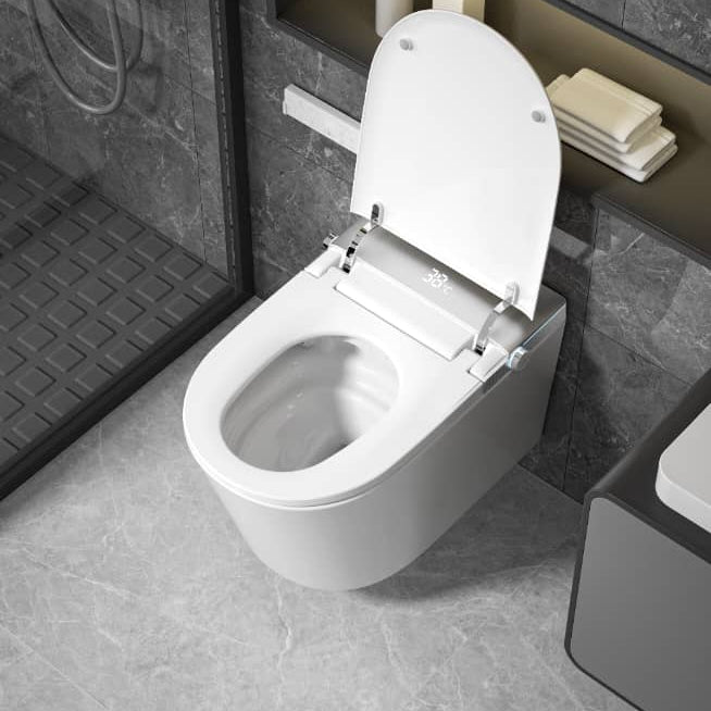 MODERN JAPANESE WALL-MOUNTED SMART TOILET WITH HEATED SEAT, REMOTE CONTROL, AND ADVANCED HYGIENE FEATURES